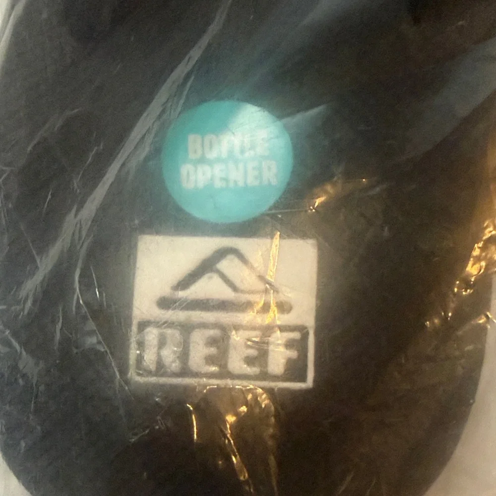 Reef Black and Silver Fanning Flip-Flop with Bottle Opener